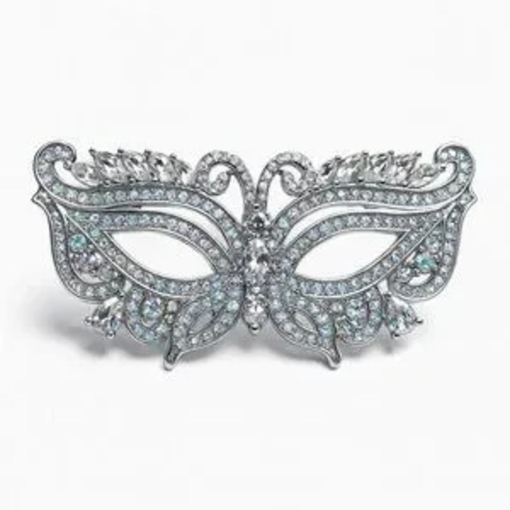 Elegant Silver Masquerade Brooch